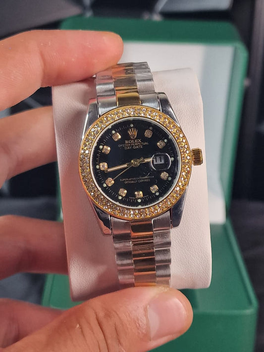 Montre Rolex day date en acier et or avec diamants